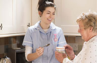 Image of elderly woman with careworker