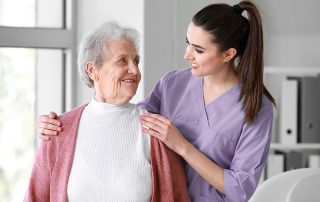 Elderly lady with home carer